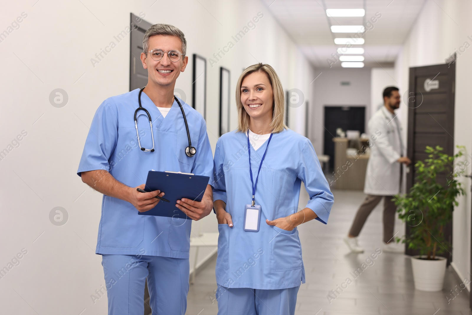 Photo of Smiling healthcare workers in hospital. Medical service