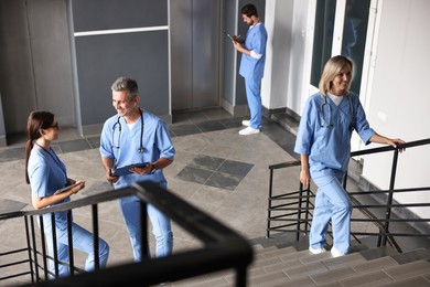 Photo of Healthcare workers in hospital, selective focus. Medical service