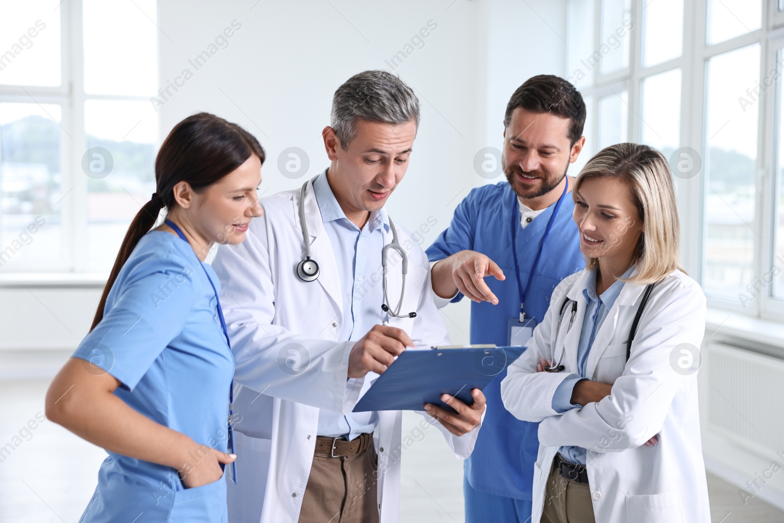 Photo of Team of healthcare workers in hospital. Medical service