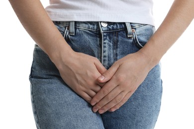 Photo of STD (sexually transmitted disease). Woman suffering from symptoms on white background, closeup