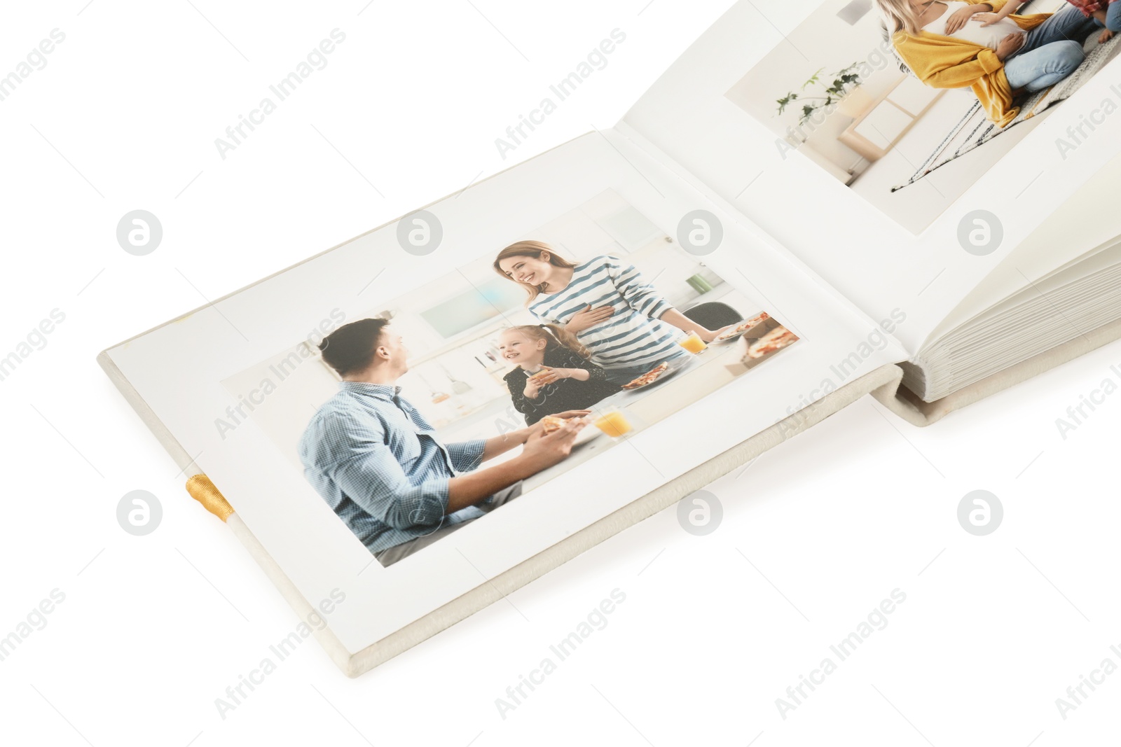 Photo of Open photo album with photos isolated on white