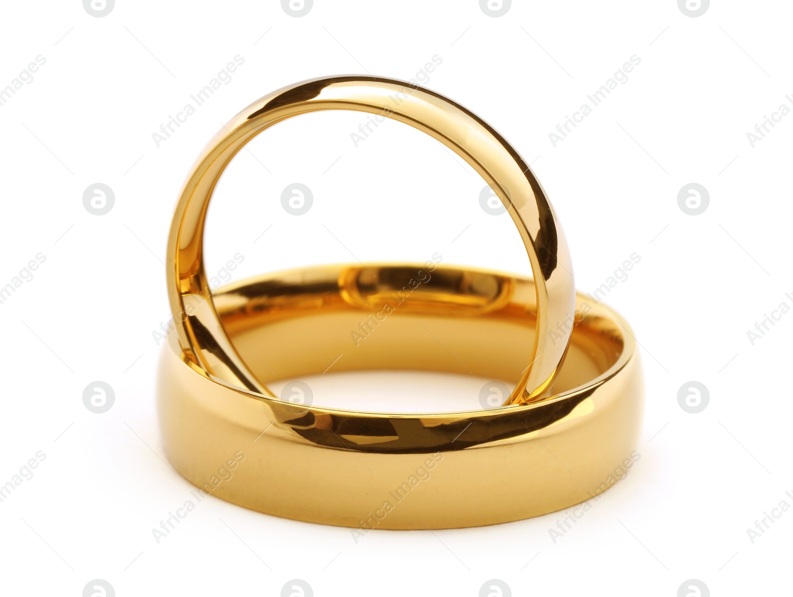 Photo of Beautiful golden wedding rings isolated on white