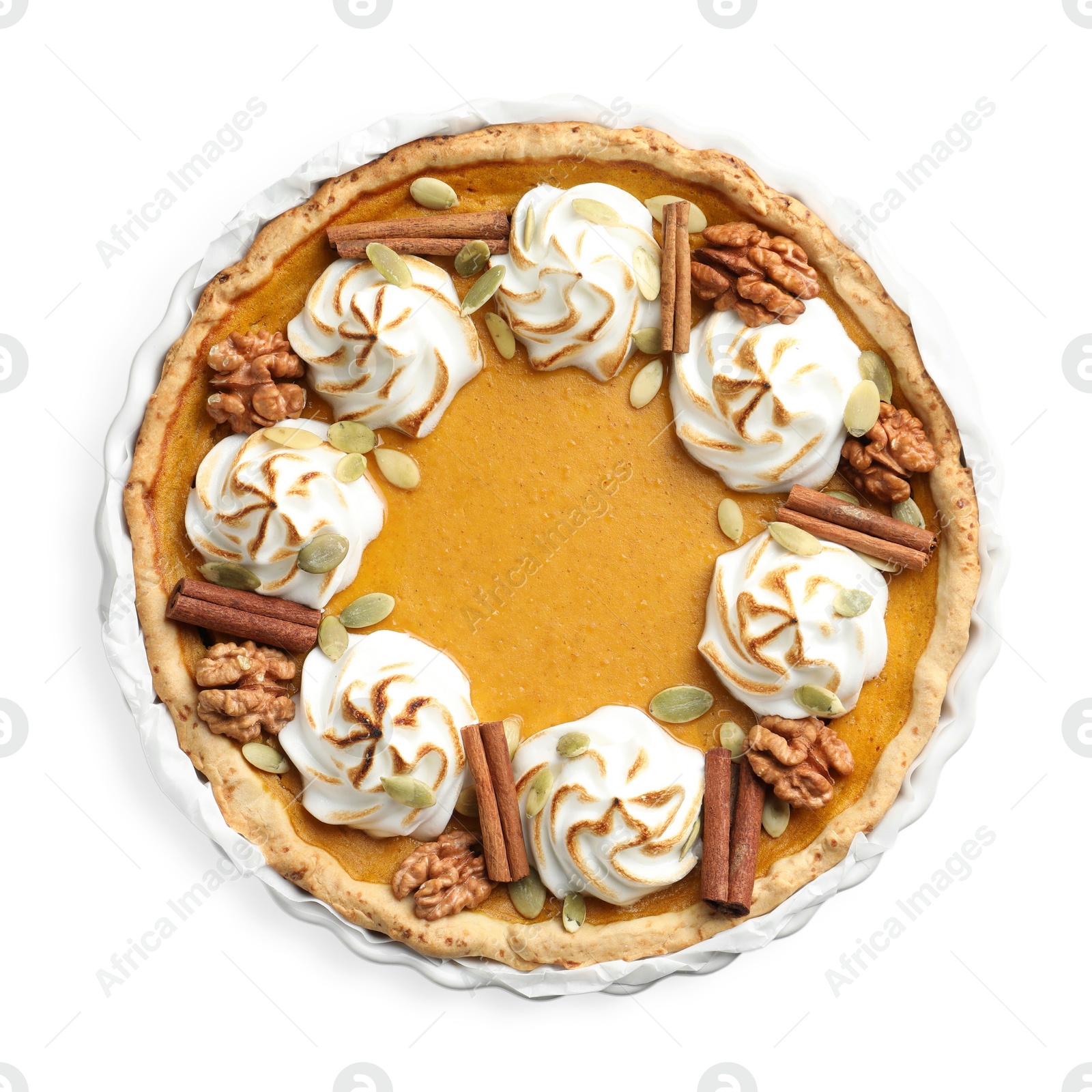 Photo of Tasty homemade pumpkin pie in baking dish isolated on white, top view