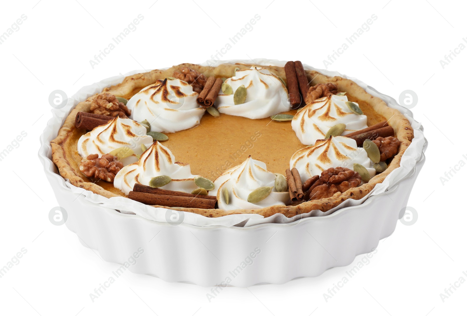 Photo of Tasty homemade pumpkin pie in baking dish isolated on white