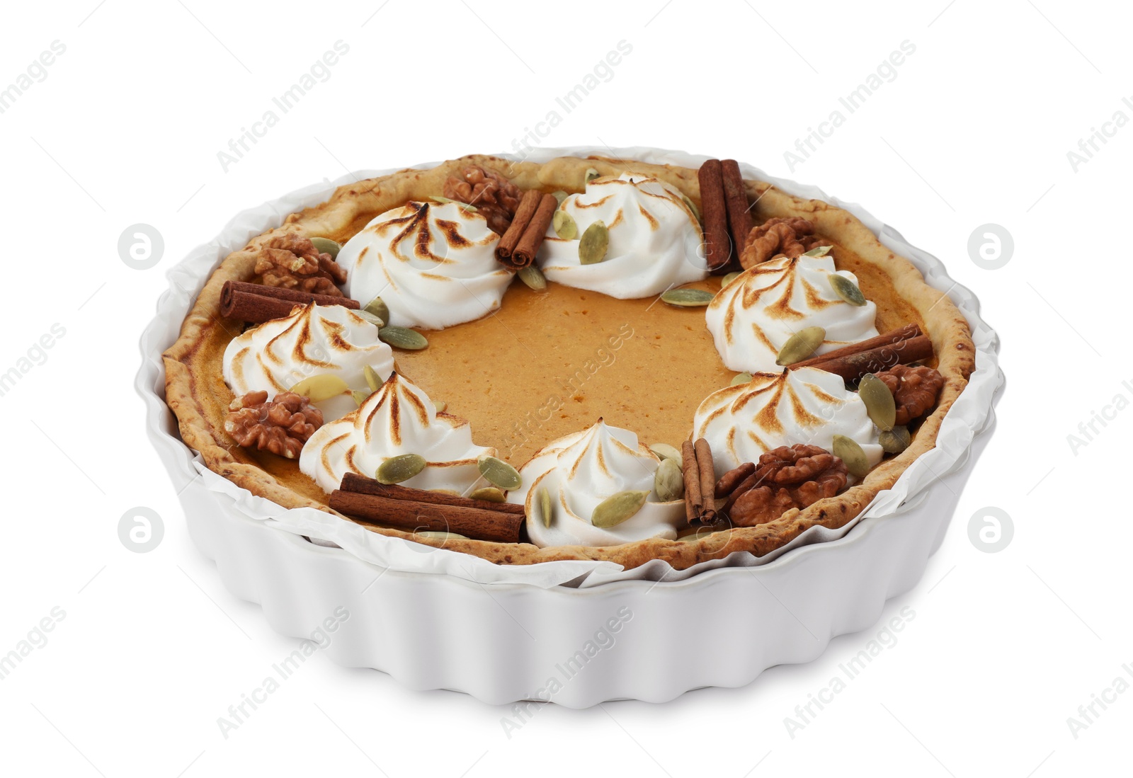 Photo of Tasty homemade pumpkin pie in baking dish isolated on white