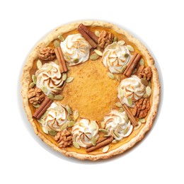 Photo of Homemade pumpkin pie with whipped cream, seeds and cinnamon isolated on white, top view