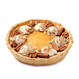 Photo of Homemade pumpkin pie with whipped cream, seeds and cinnamon isolated on white