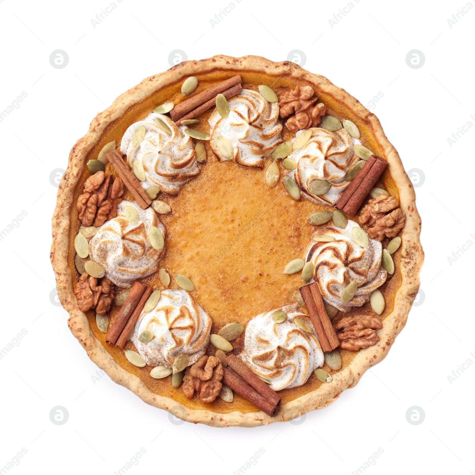 Photo of Homemade pumpkin pie with whipped cream, seeds and cinnamon isolated on white, top view