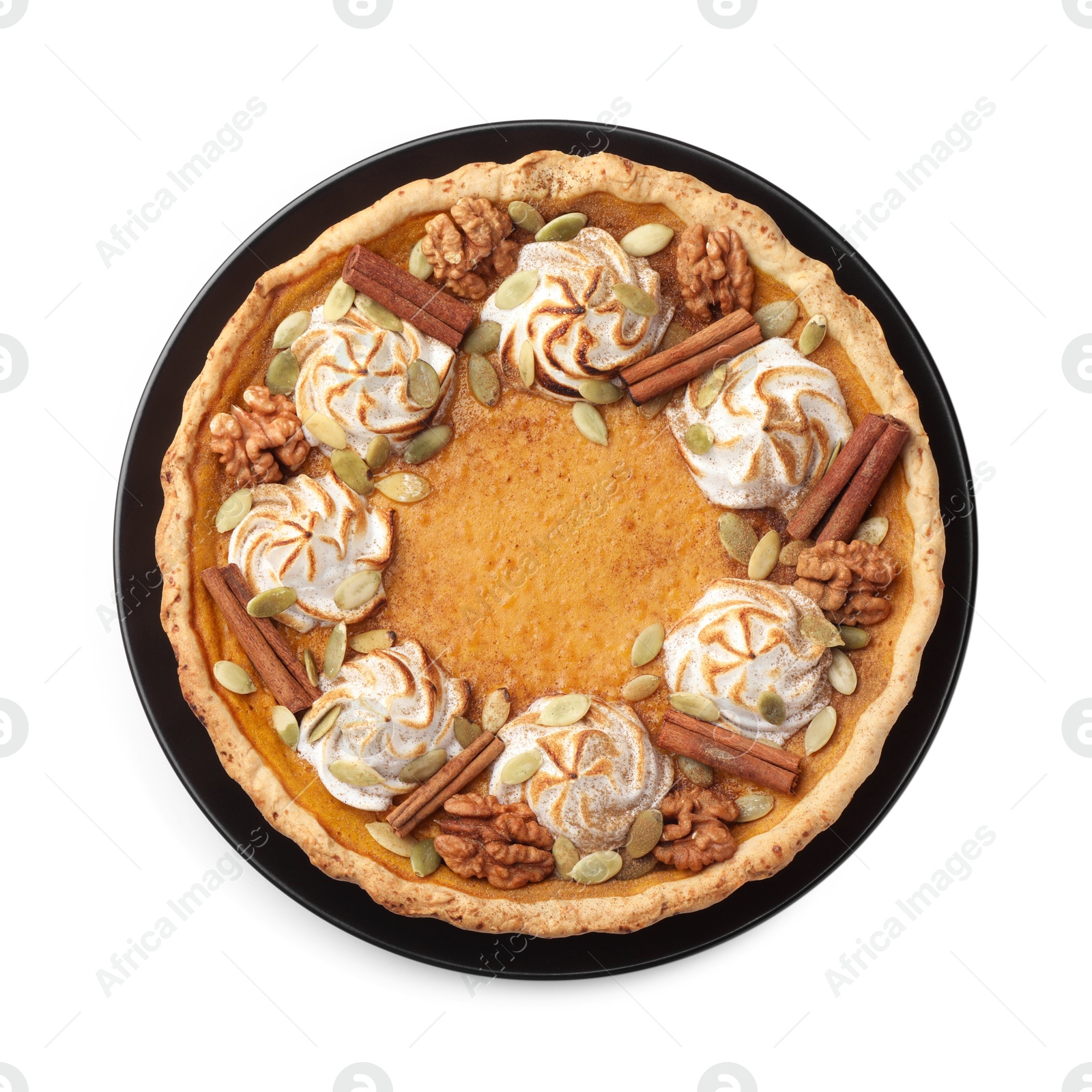 Photo of Homemade pumpkin pie with whipped cream, seeds and cinnamon isolated on white, top view