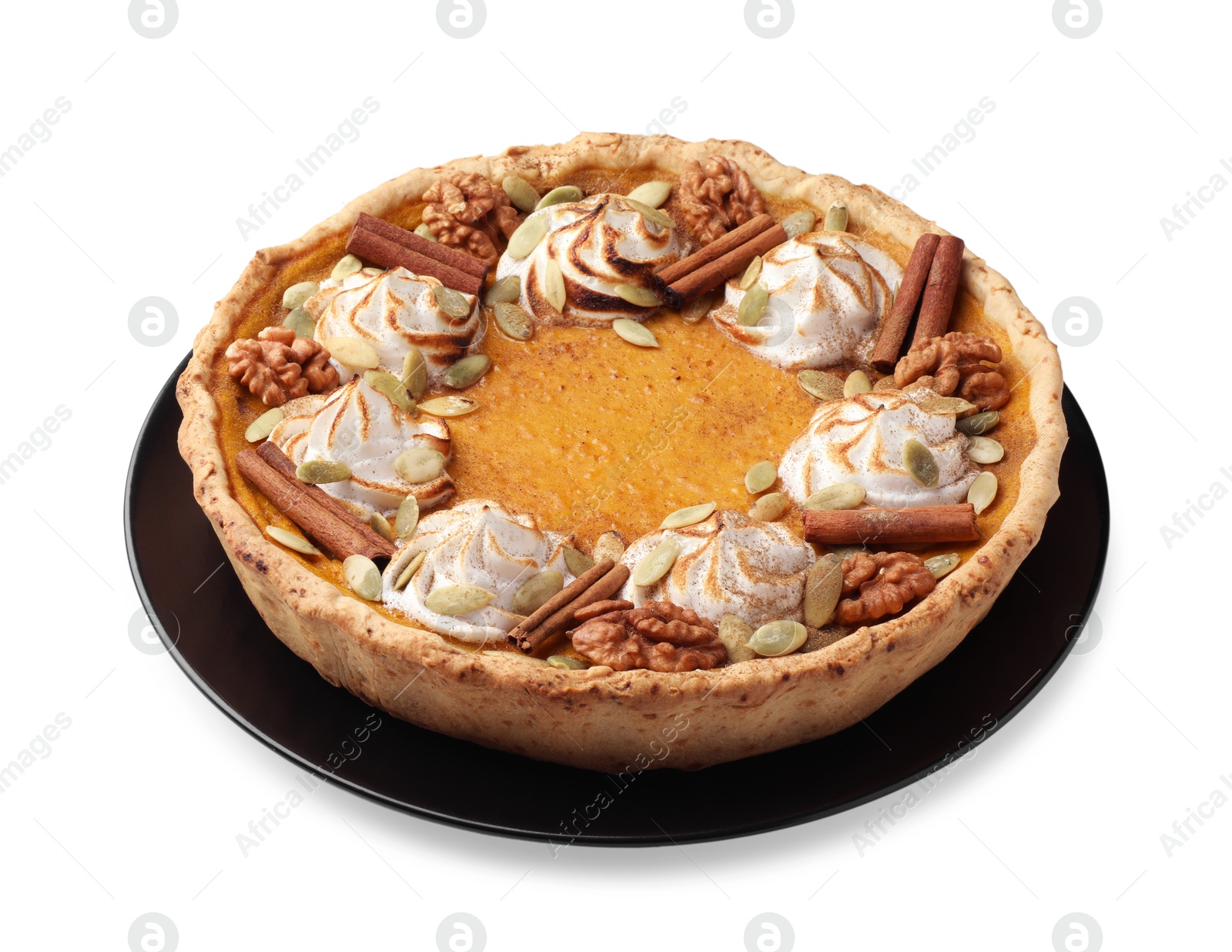 Photo of Homemade pumpkin pie with whipped cream, seeds and cinnamon isolated on white