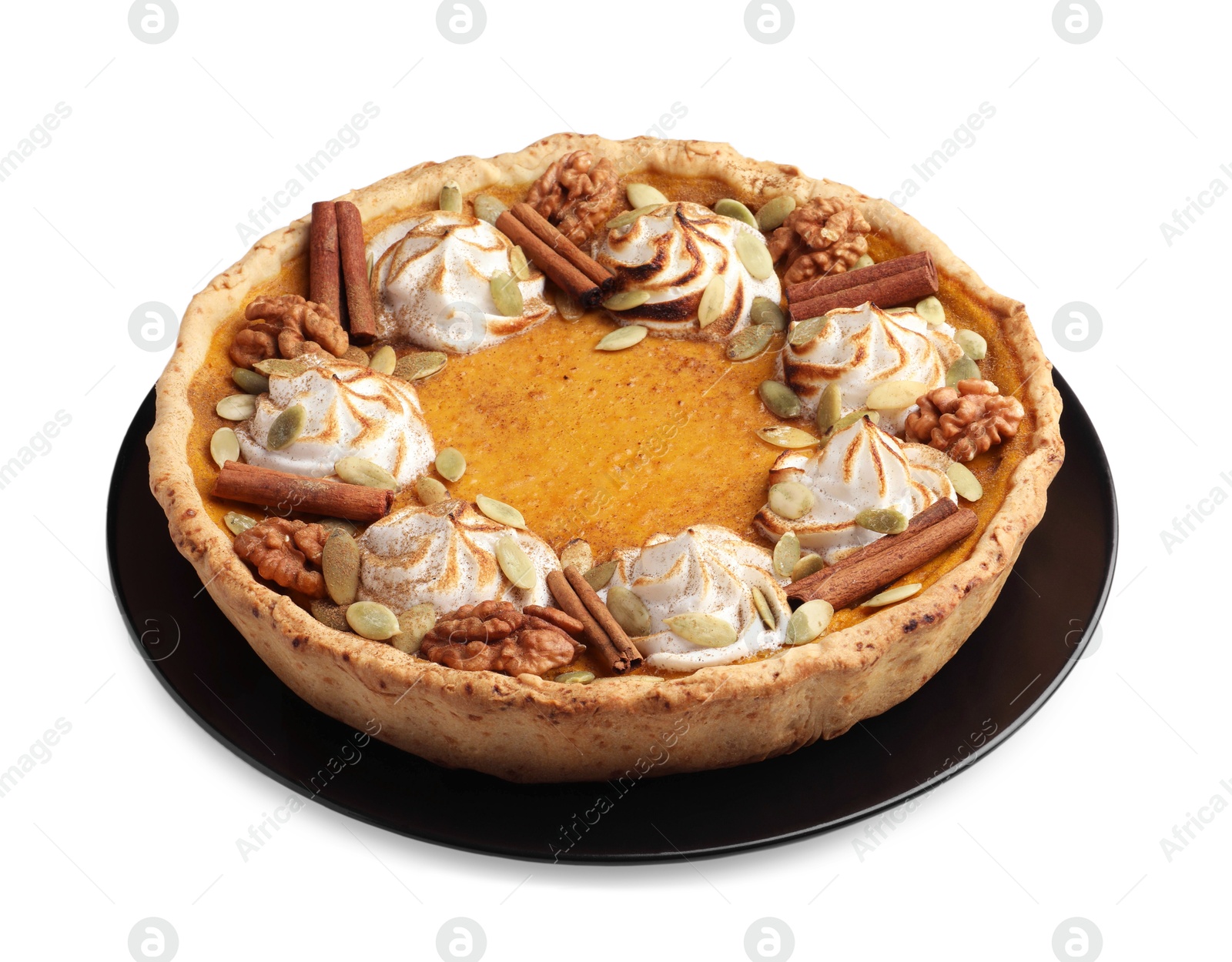 Photo of Homemade pumpkin pie with whipped cream, seeds and cinnamon isolated on white