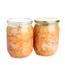 Photo of Canned meat in glass jars isolated on white