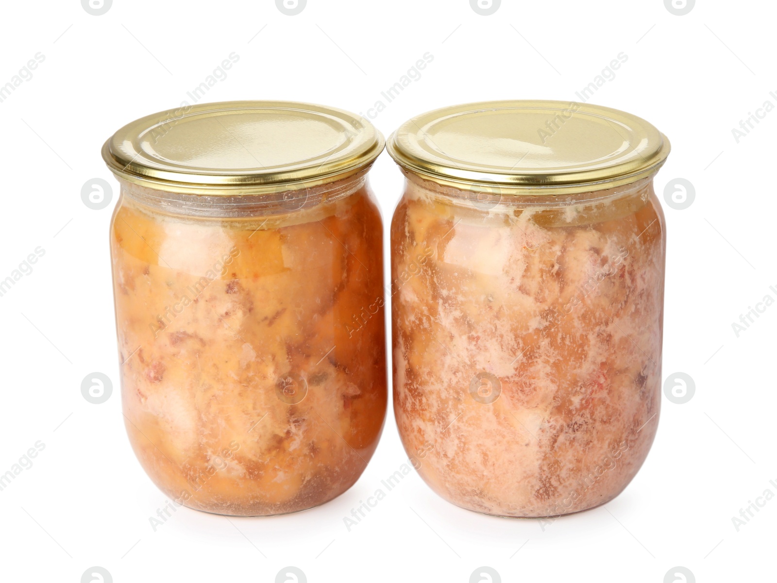 Photo of Canned meat in glass jars isolated on white