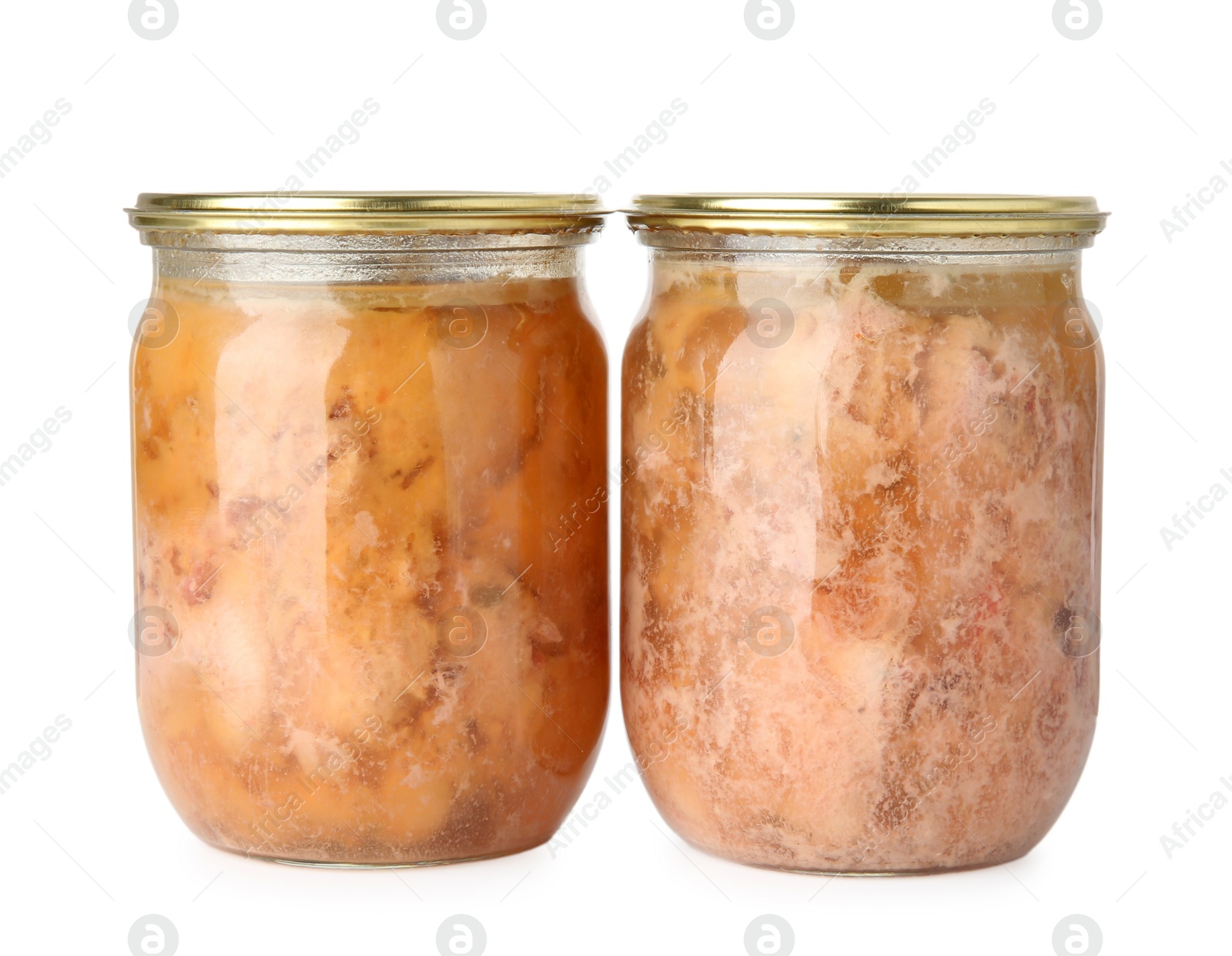 Photo of Canned meat in glass jars isolated on white