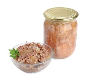 Photo of Canned meat in glass bowl, jar and parsley isolated on white