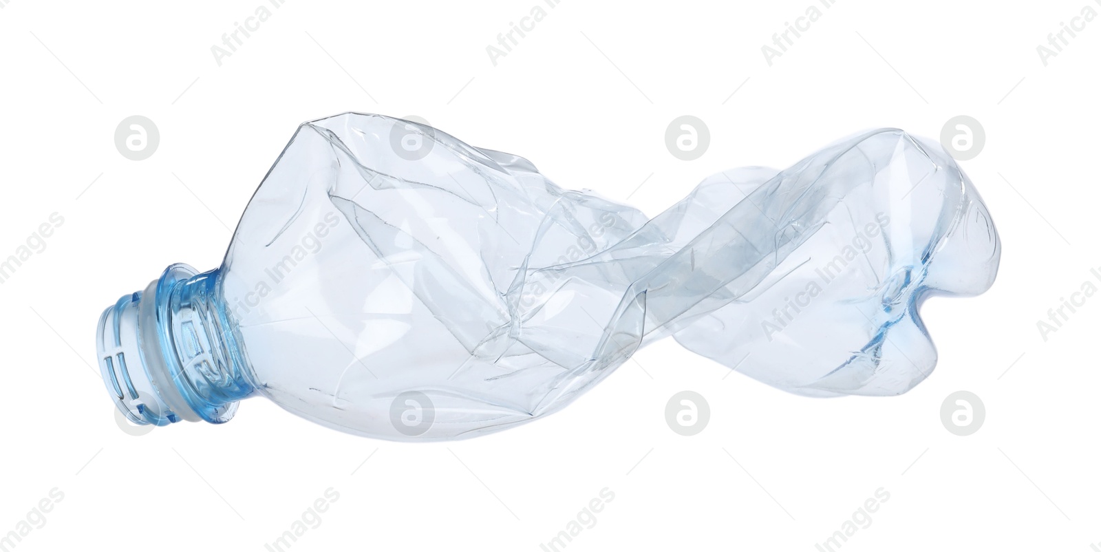 Photo of One crumpled plastic bottle isolated on white