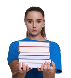 Photo of Stressful student with stack of books before exam isolated on white