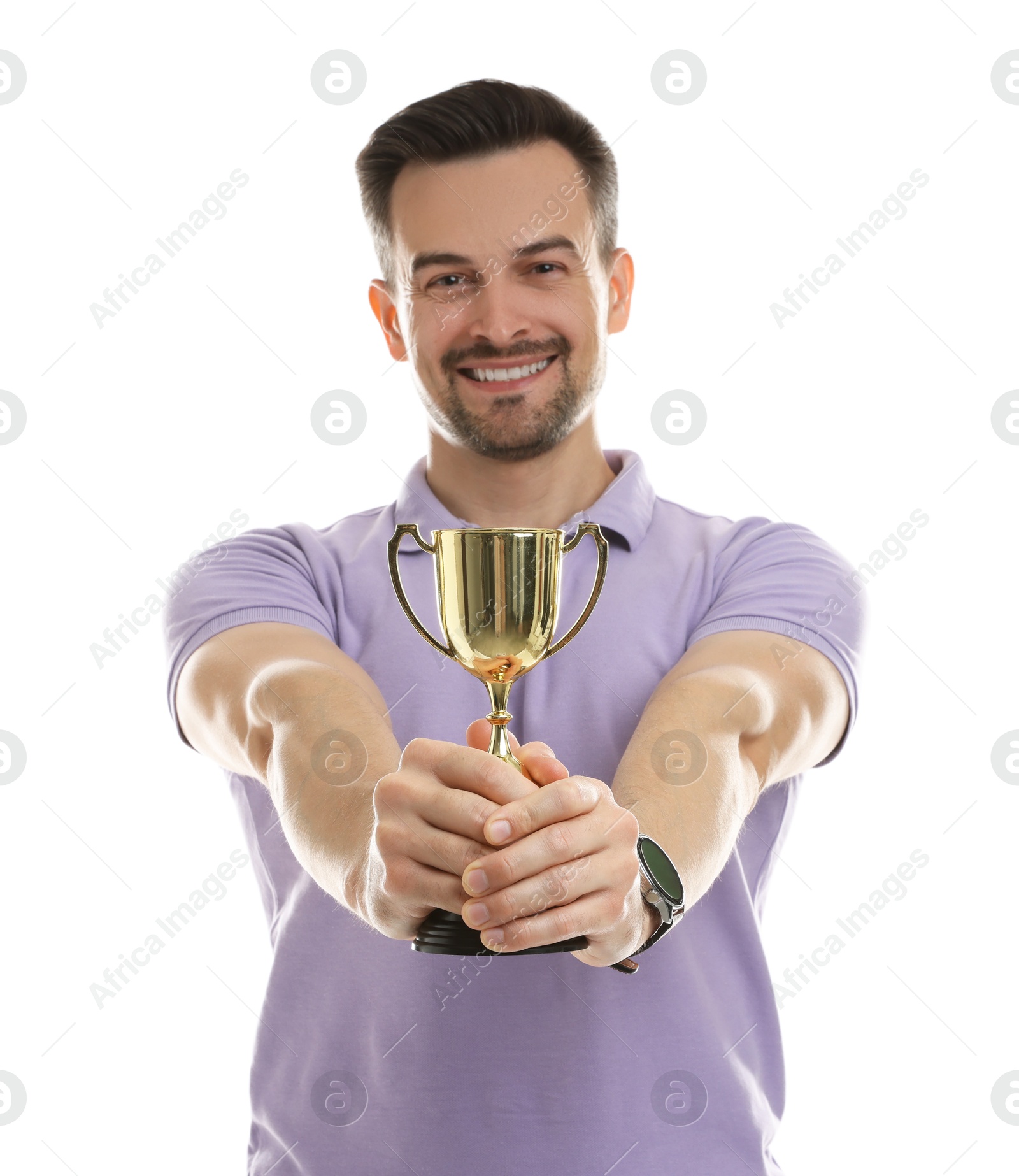 Photo of Happy winner with golden trophy cup on white background