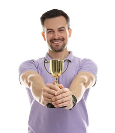 Photo of Happy winner with golden trophy cup on white background