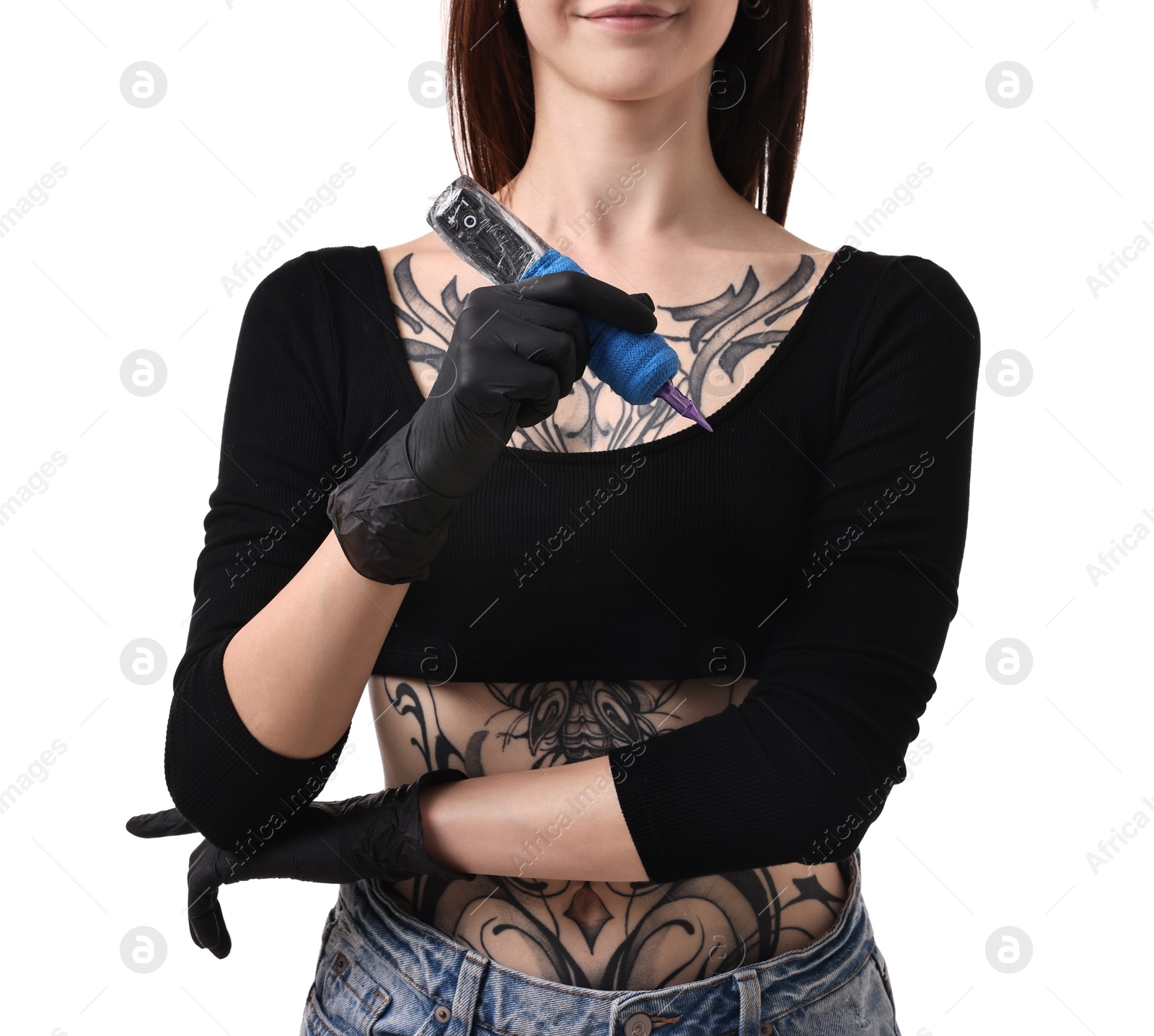 Photo of Professional artist in gloves holding tattoo machine on white background, closeup