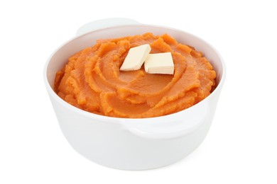 Photo of Tasty mashed sweet potato and butter in bowl isolated on white