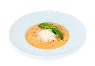 Photo of Delicious sweet potato soup with basil and parmesan cheese isolated on white