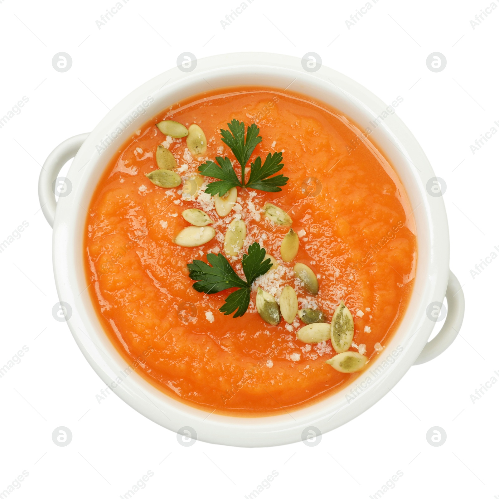 Delicious sweet potato soup with pumpkin seeds and parsley in bowl isolated on white, top view Photo of Delicious sweet potato soup with pumpkin seeds and parsley in bowl isolated on white, top view