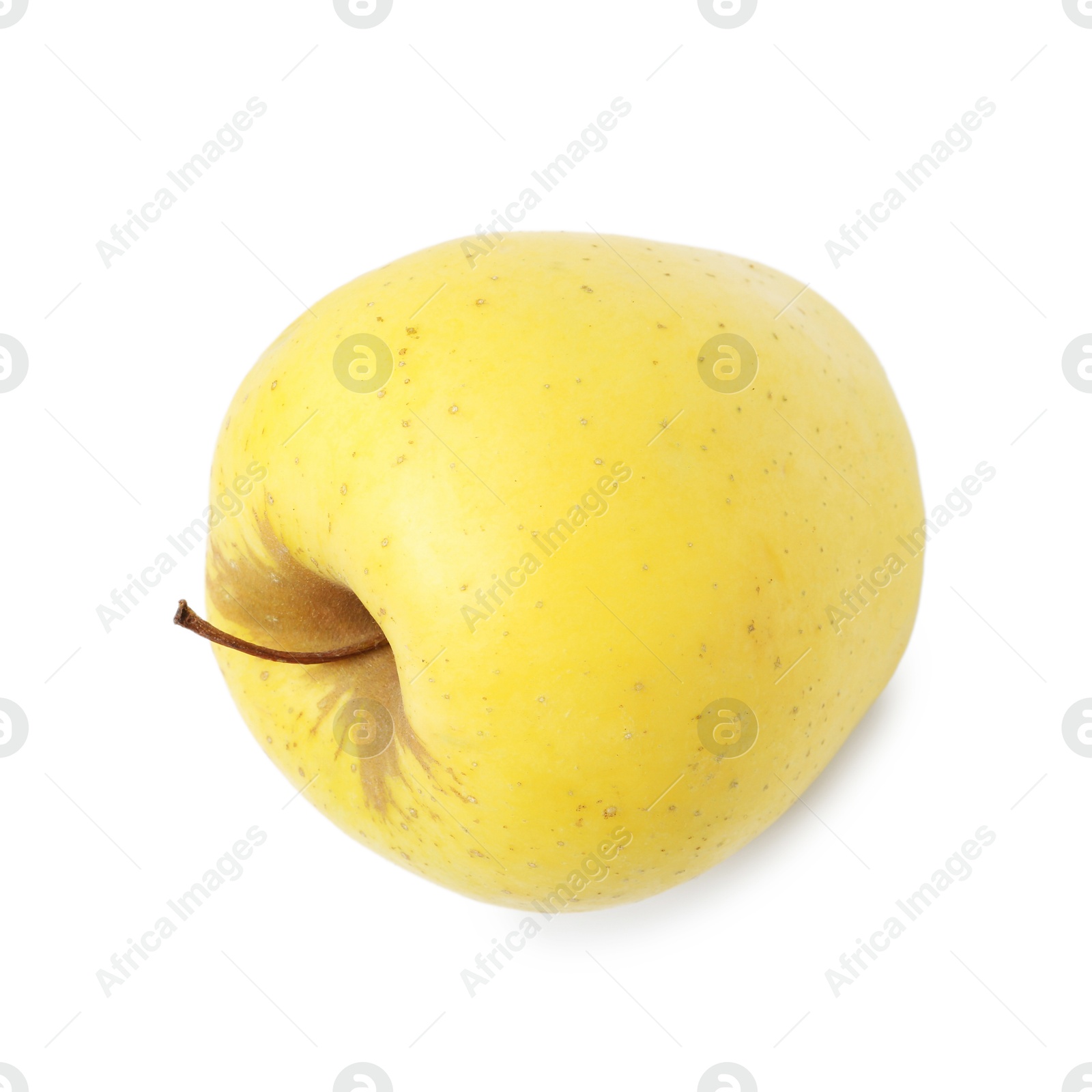 Photo of One fresh yellow apple isolated on white