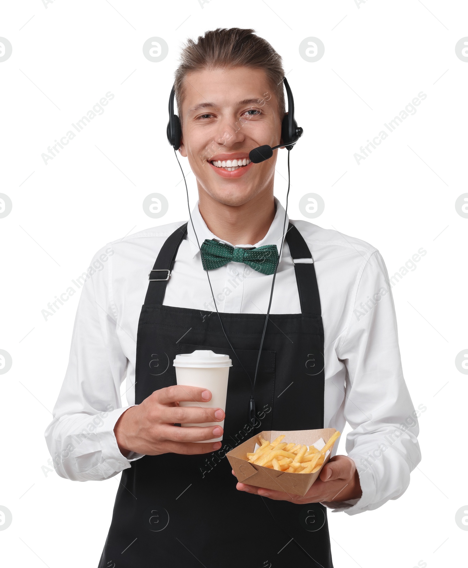 Photo of Fast-food worker holding paper container with fries and cup on white background