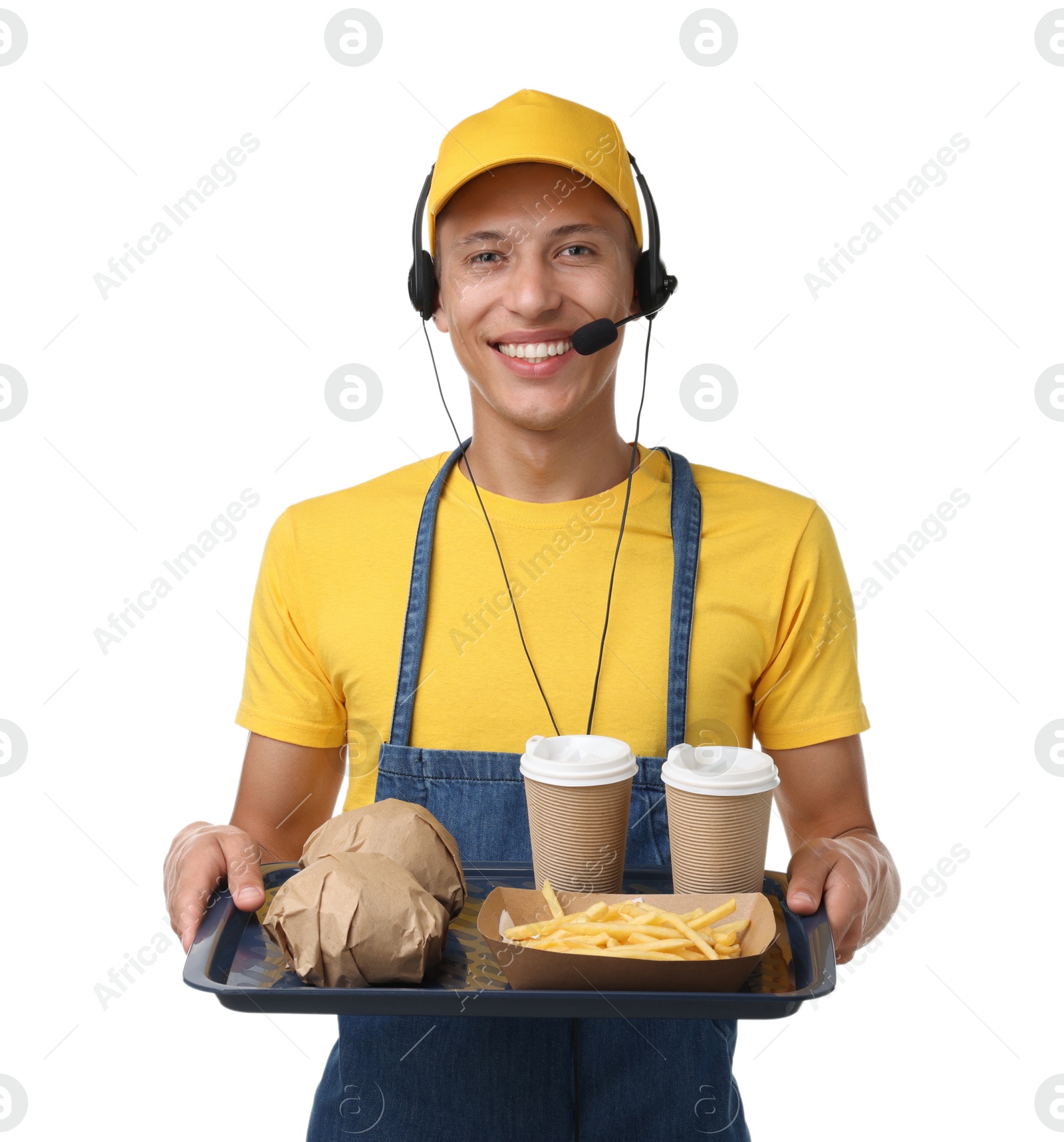 Photo of Fast-food worker holding tray with order on white background