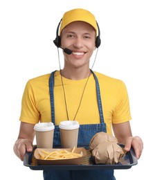 Photo of Fast-food worker holding tray with order on white background