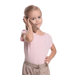 Photo of Cute little girl talking on smartphone against white background