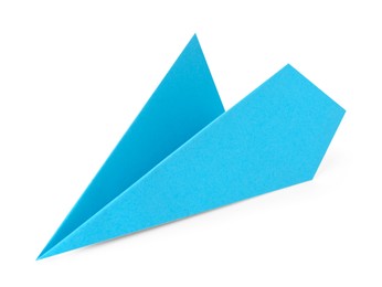 Photo of One handmade light blue paper plane isolated on white