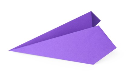 Photo of One handmade purple paper plane isolated on white