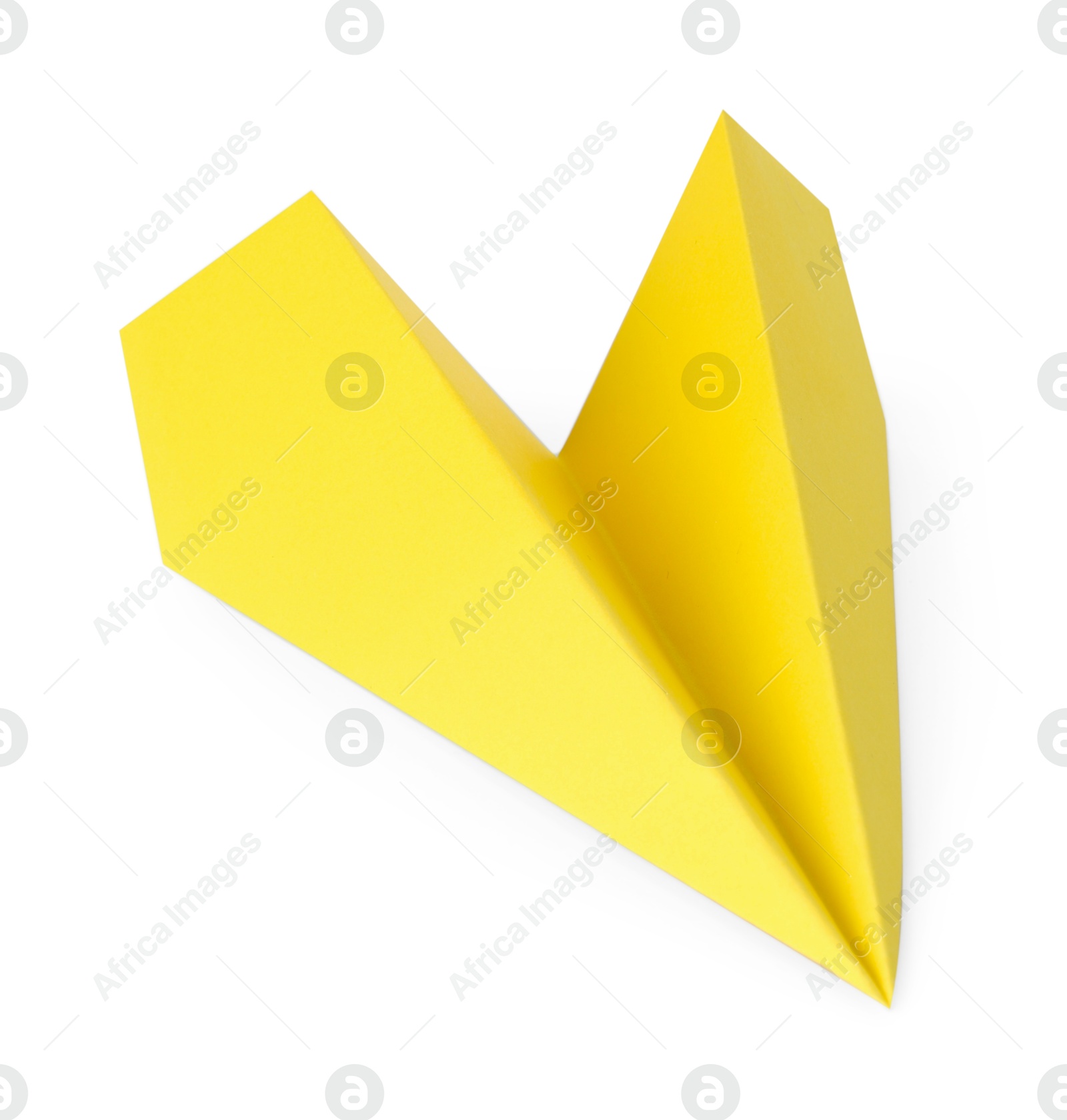 Photo of One handmade yellow paper plane isolated on white