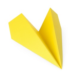 Photo of One handmade yellow paper plane isolated on white