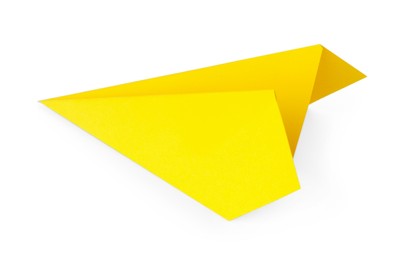 Photo of One handmade yellow paper plane isolated on white