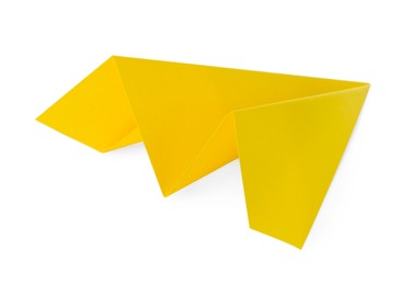 Photo of One handmade yellow paper plane isolated on white