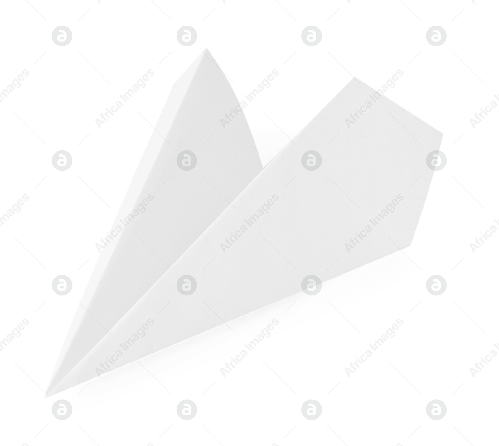 Photo of One handmade paper plane isolated on white