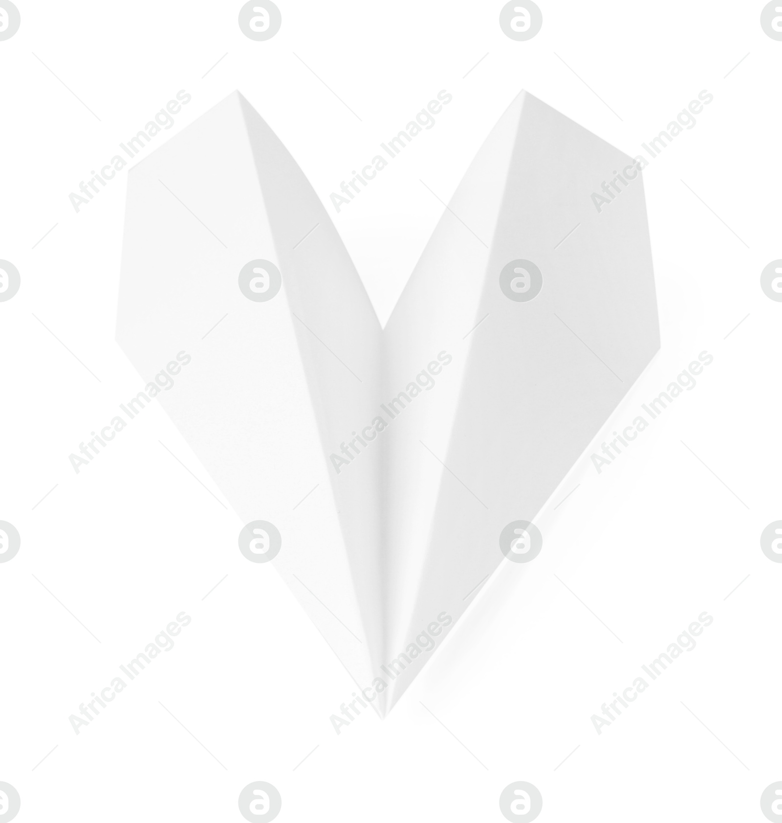 Photo of One handmade paper plane isolated on white