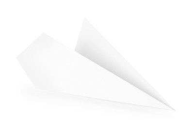 Photo of One handmade paper plane isolated on white