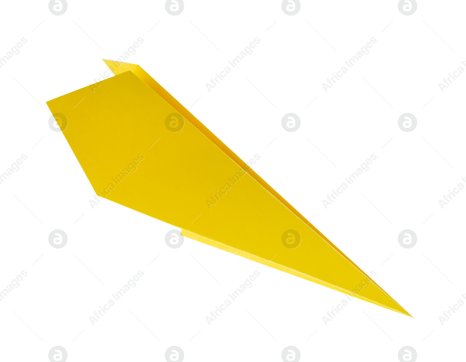 Photo of One handmade yellow paper plane isolated on white