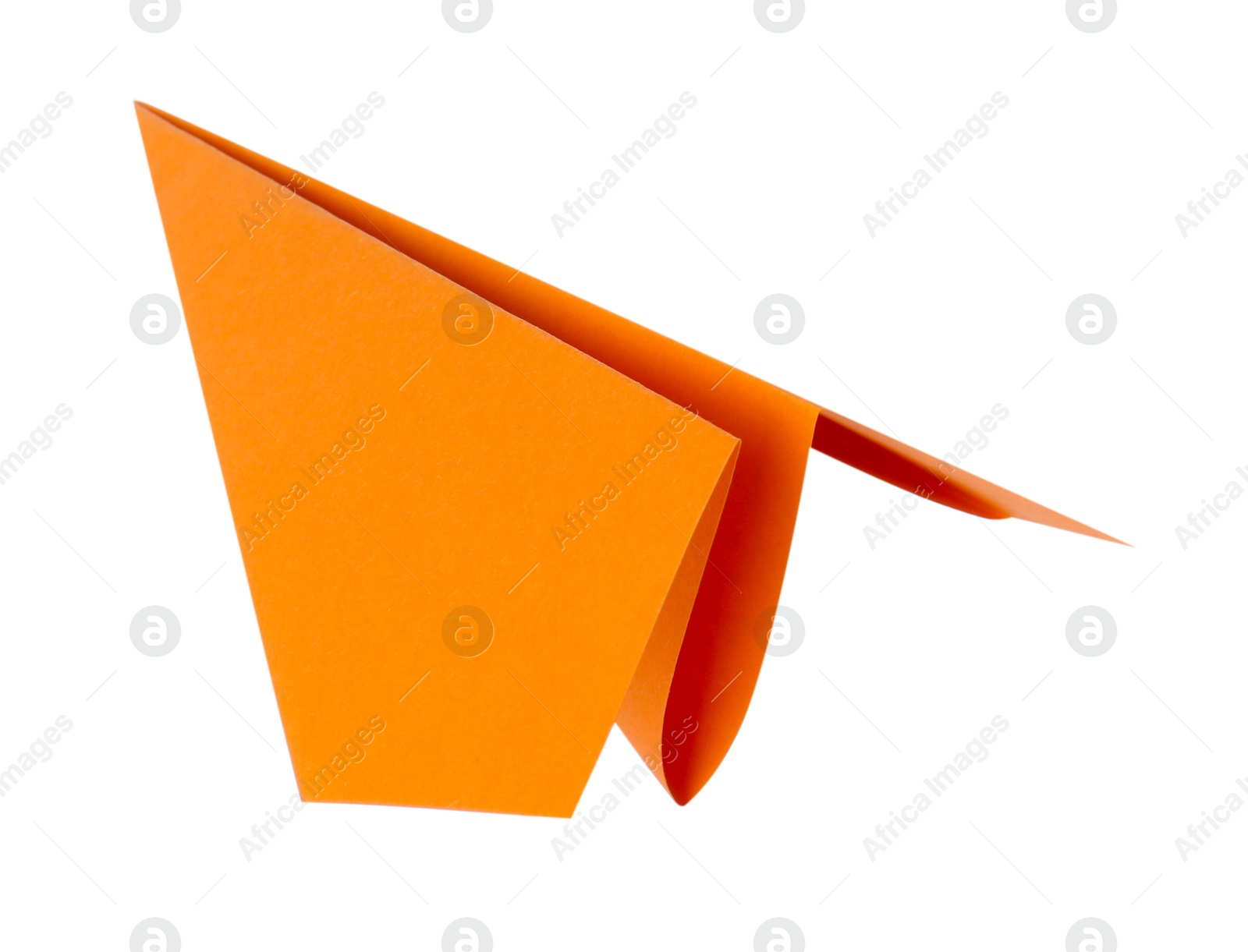 Photo of One handmade orange paper plane isolated on white