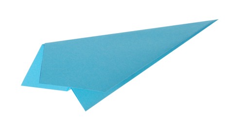 Photo of One handmade light blue paper plane isolated on white