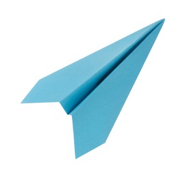 Photo of One handmade light blue paper plane isolated on white