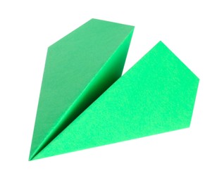 Photo of One handmade green paper plane isolated on white