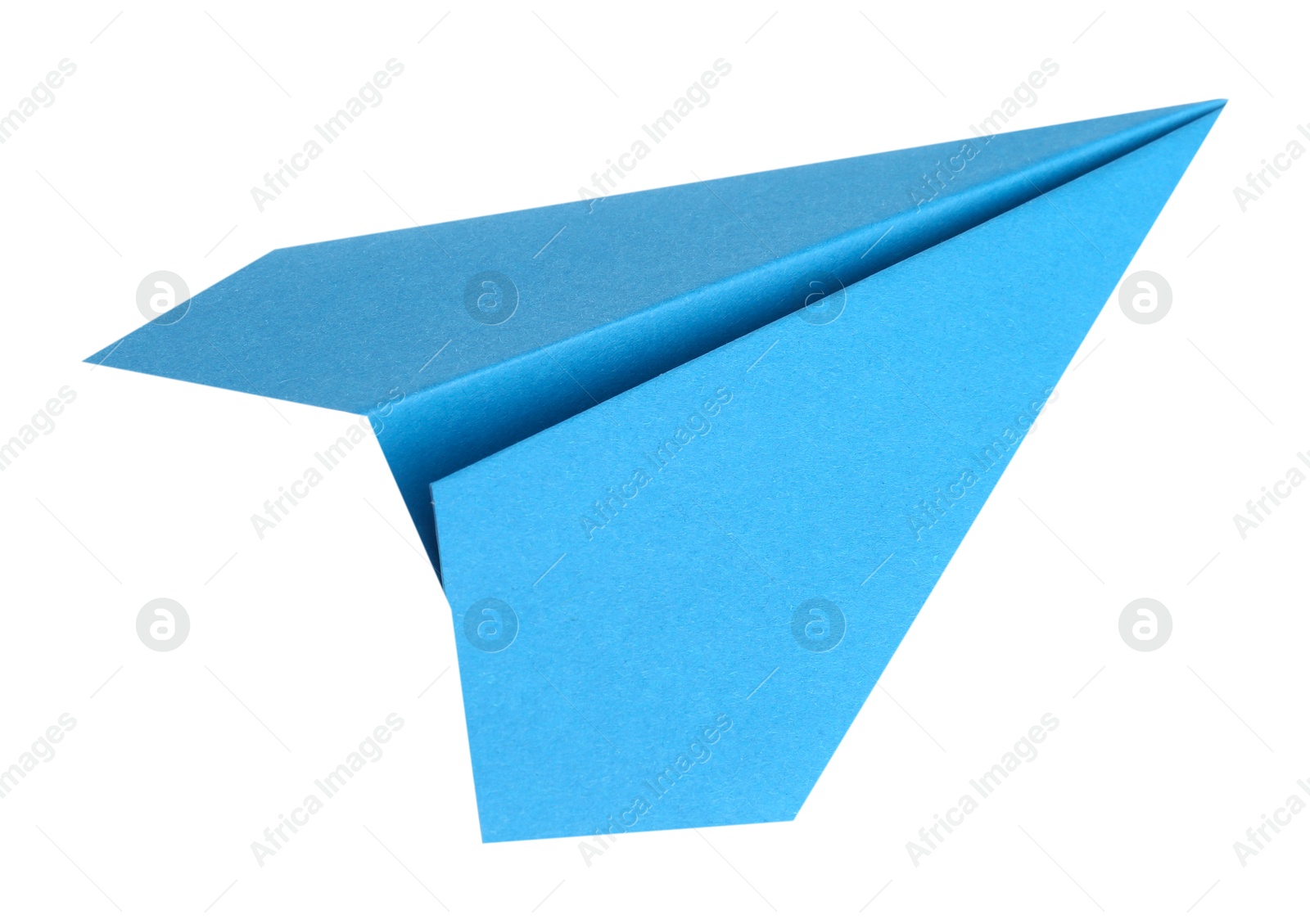 Photo of One handmade light blue paper plane isolated on white