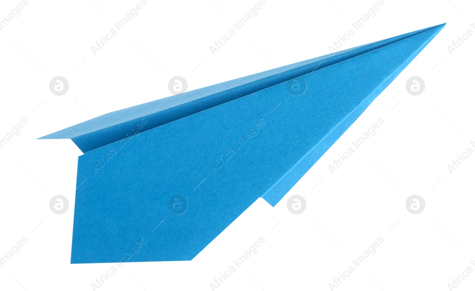 Photo of One handmade light blue paper plane isolated on white