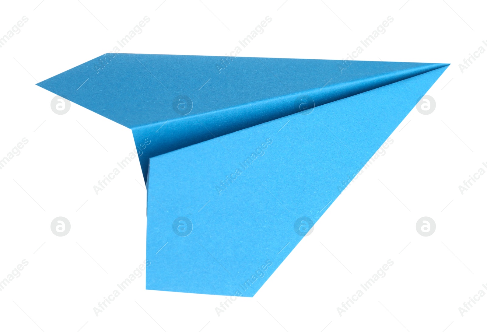 Photo of One handmade light blue paper plane isolated on white