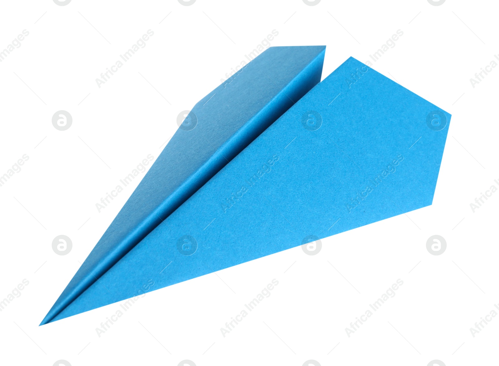 Photo of One handmade light blue paper plane isolated on white